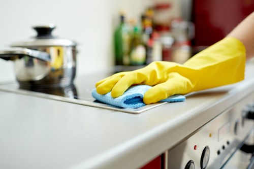 Cleaner in Clapham preparing a kitchen for a deep clean